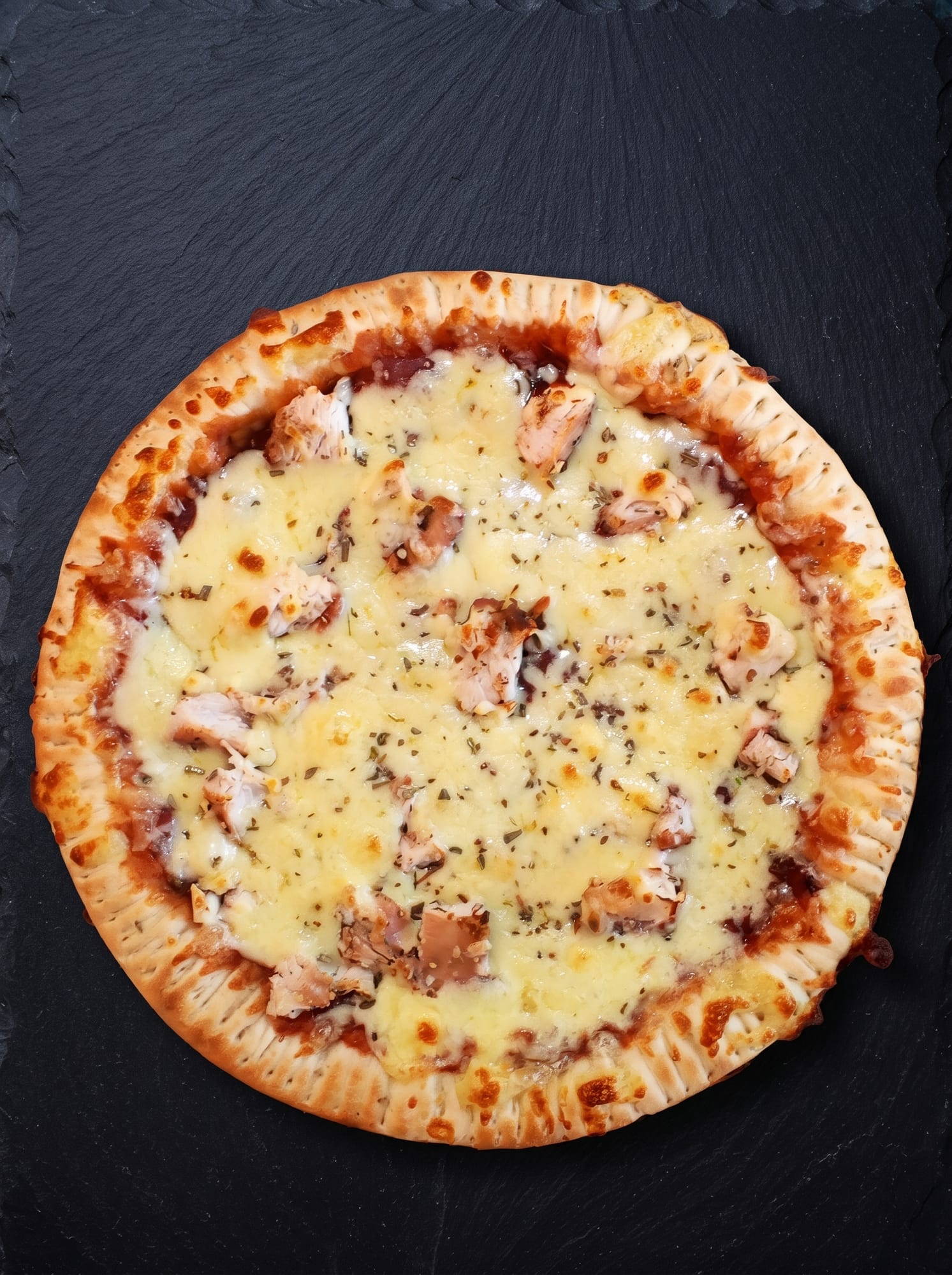 A wood-fired Queso pizza straight from the oven